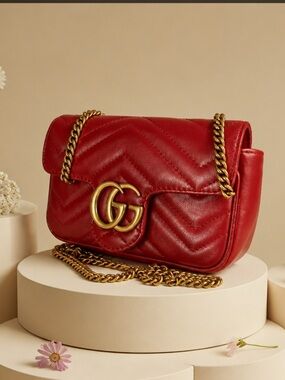 Gucci Red Leather Mini Marmot Crossbody Bag.